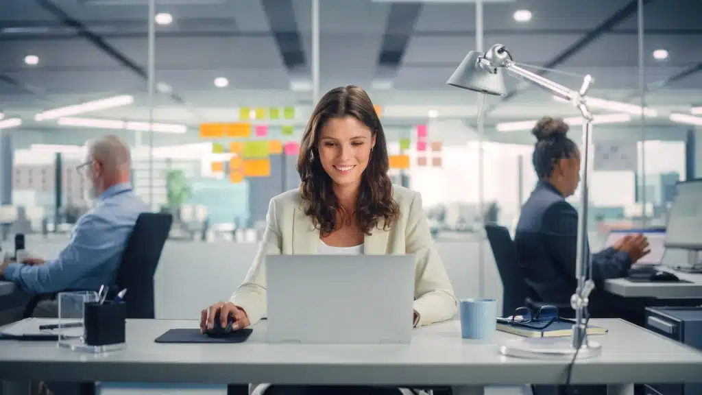 Young happy woman working