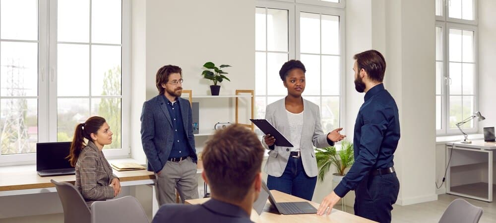 A bunch of workers having a meeting